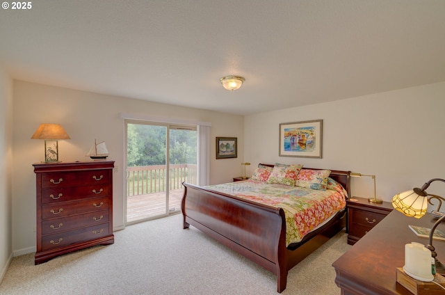 315 5th St NW Unit 101, Long Beach, WA 98631 - bedroom with access to exterior and light colored carpet