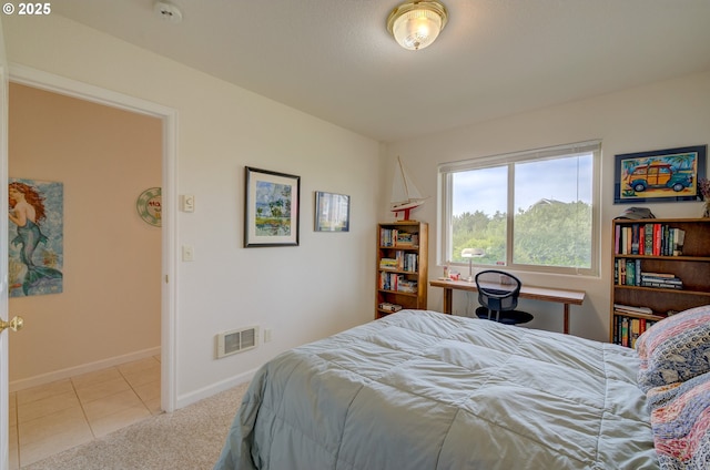 315 5th St NW Unit 101, Long Beach, WA 98631 - tiled bedroom with baseboards and carpet