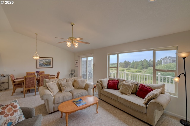315 5th St NW Unit 101, Long Beach, WA 98631 - living room featuring light carpet, a ceiling fan, and vaulted ceiling