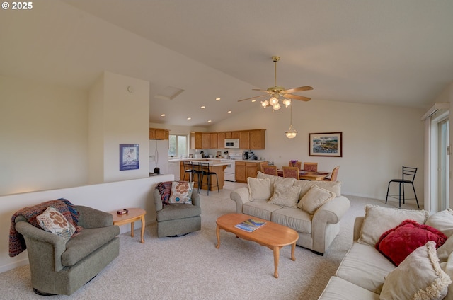 315 5th St NW Unit 101, Long Beach, WA 98631 - living area featuring vaulted ceiling, light colored carpet, ceiling fan, and recessed lighting