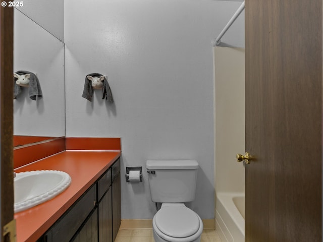 full bath with toilet, washtub / shower combination, tile patterned floors, and vanity