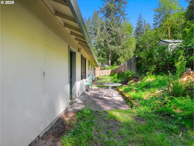 view of yard with a patio and a fenced backyard