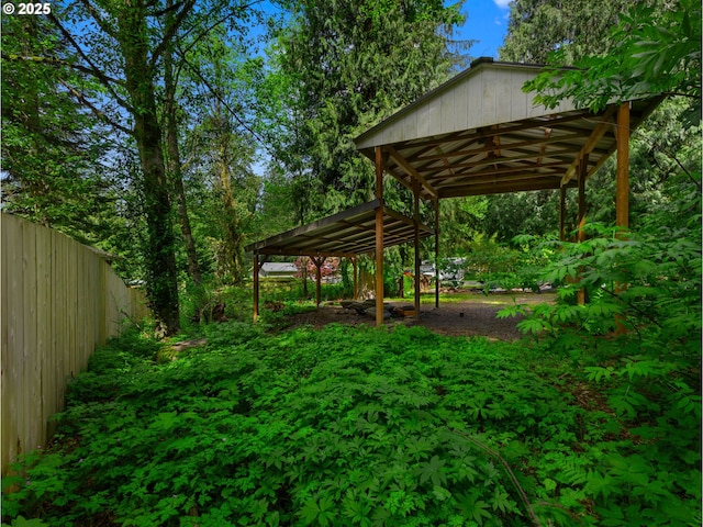 surrounding community featuring fence
