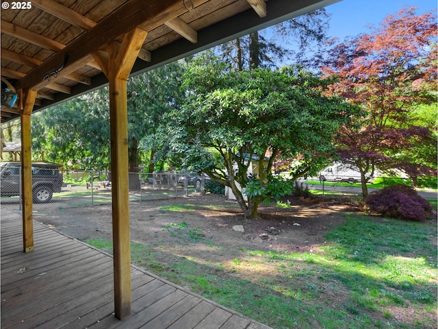 wooden deck featuring fence