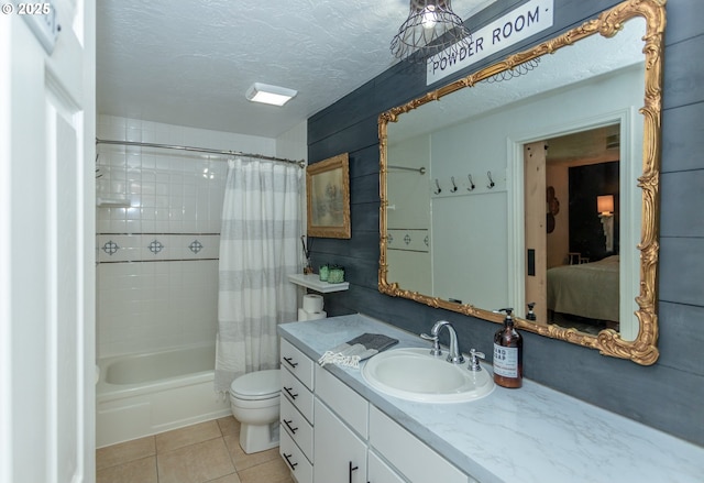 full bathroom with shower / bath combination with curtain, tile patterned flooring, vanity, toilet, and a textured ceiling