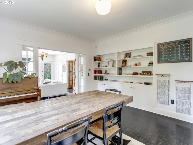 1630 SE 46th Ave, Portland, OR 97215 - dining room with crown molding, a chandelier, and wood finished floors