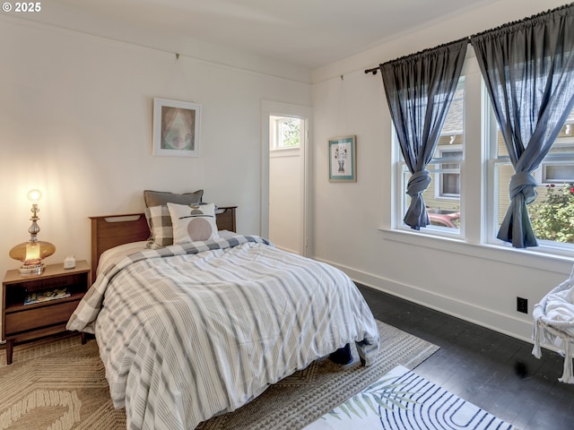 1630 SE 46th Ave, Portland, OR 97215 - bedroom featuring dark wood-style floors and baseboards
