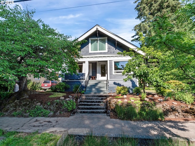 1630 SE 46th Ave, Portland, OR 97215 - view of front of home with covered porch and stairway
