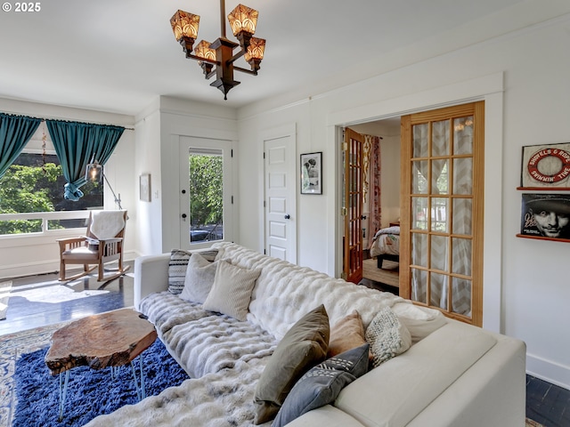 1630 SE 46th Ave, Portland, OR 97215 - living room featuring baseboards and wood finished floors