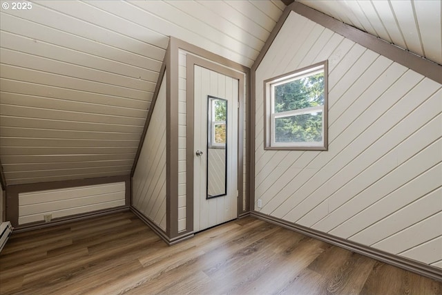 2251 SE 139th Ave, Portland, OR 97233 - additional living space featuring lofted ceiling, wood walls, and wood finished floors