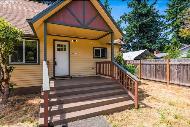 2251 SE 139th Ave, Portland, OR 97233 - doorway to property with a shingled roof