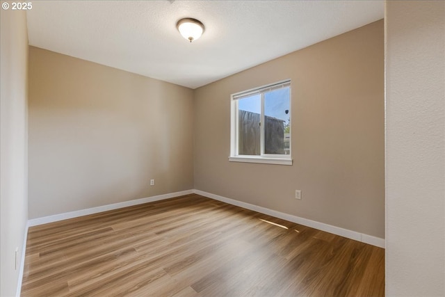 2251 SE 139th Ave, Portland, OR 97233 - unfurnished room featuring wood finished floors