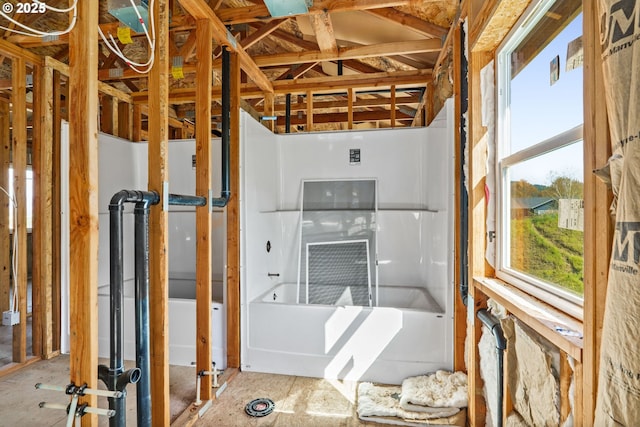 interior space featuring vaulted ceiling