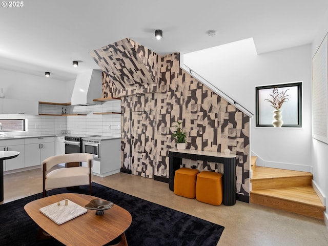 living area with baseboards