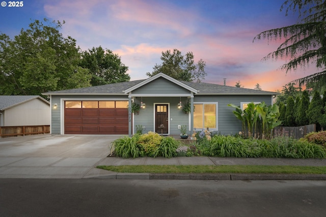 23072 SW Mansfield St, Sherwood, OR 97140 - ranch-style house with a garage, driveway, and a shingled roof