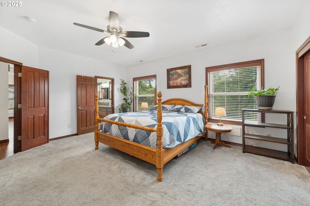 23072 SW Mansfield St, Sherwood, OR 97140 - carpeted bedroom with baseboards, a ceiling fan, and ensuite bath