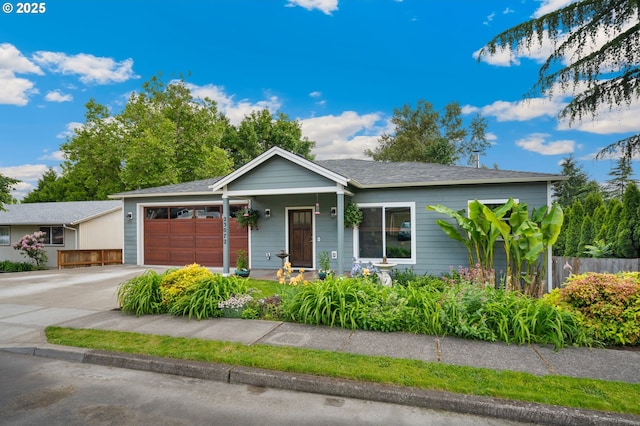23072 SW Mansfield St, Sherwood, OR 97140 - ranch-style home with an attached garage and concrete driveway