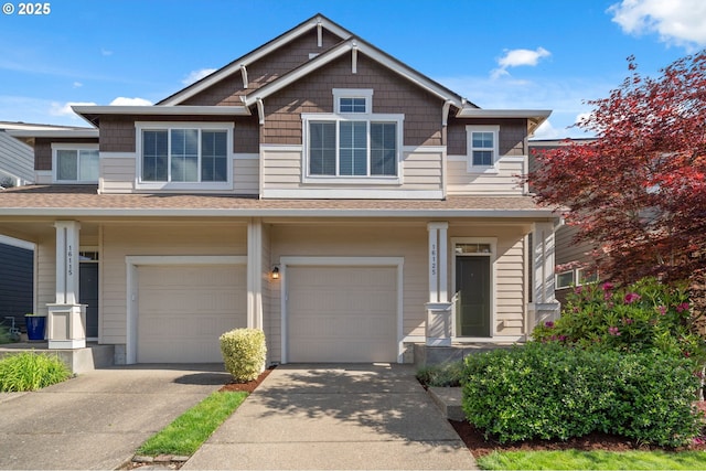 16125 SE Kingbird Dr, Clackamas, OR 97015 - view of front of house with a garage, driveway, and roof with shingles