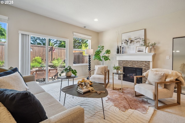 16125 SE Kingbird Dr, Clackamas, OR 97015 - living room featuring carpet floors, a fireplace, recessed lighting, and baseboards