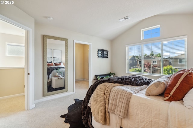 16125 SE Kingbird Dr, Clackamas, OR 97015 - carpeted bedroom with vaulted ceiling and baseboards