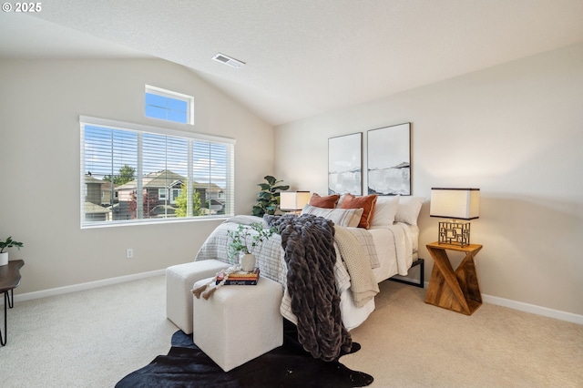 16125 SE Kingbird Dr, Clackamas, OR 97015 - carpeted bedroom with lofted ceiling, multiple windows, and baseboards