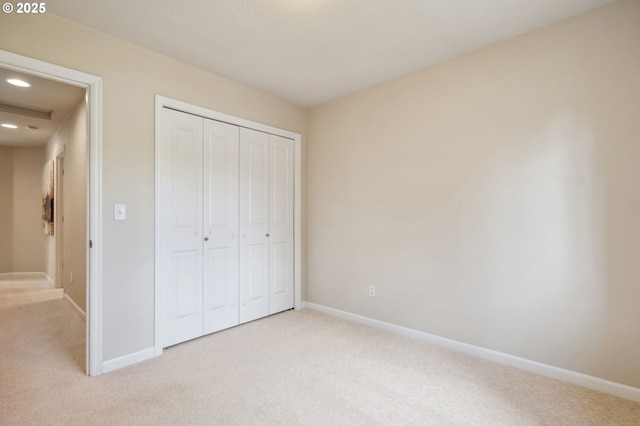 16125 SE Kingbird Dr, Clackamas, OR 97015 - unfurnished bedroom with carpet flooring, baseboards, a closet, and recessed lighting