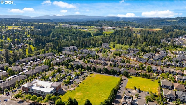 16125 SE Kingbird Dr, Clackamas, OR 97015 - aerial view of residential area with mountains and a heavily wooded area