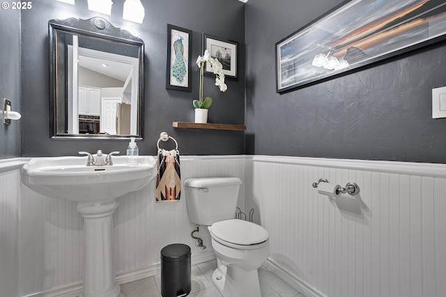 16904 SW Stellar Dr, Sherwood, OR 97140 - bathroom with a wainscoted wall and toilet