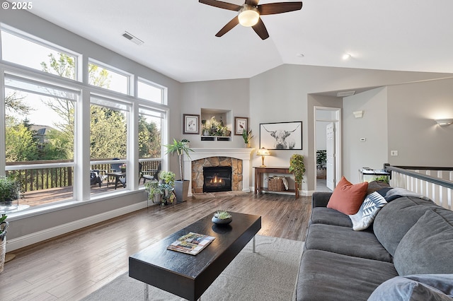 16904 SW Stellar Dr, Sherwood, OR 97140 - living room with a ceiling fan, lofted ceiling, wood finished floors, and a fireplace