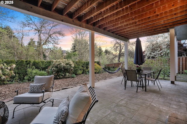 16904 SW Stellar Dr, Sherwood, OR 97140 - patio terrace at dusk featuring a patio, outdoor dining space, and a fenced backyard