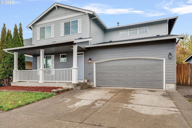 view of front of home featuring a porch, driveway, an attached garage, and fence