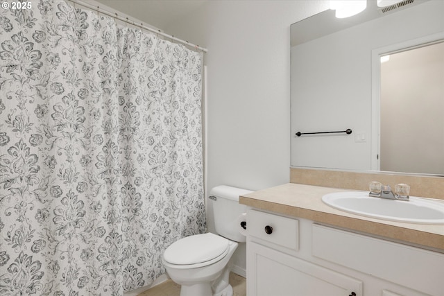 bathroom with vanity, a shower with curtain, visible vents, and toilet