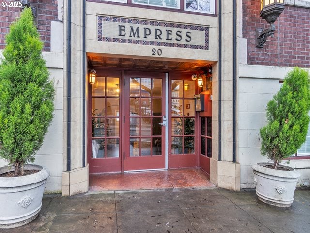 view of exterior entry featuring french doors