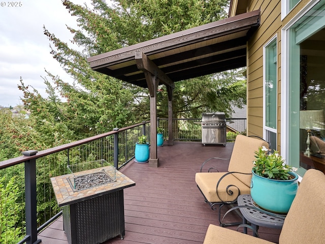 2231 SE Genesis Ct, Salem, OR 97306 - wooden terrace featuring a fire pit and a grill