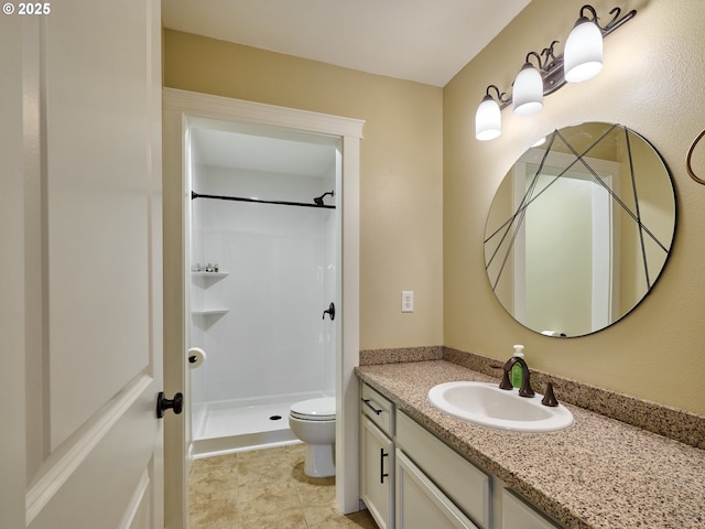 2231 SE Genesis Ct, Salem, OR 97306 - full bathroom with vanity, a stall shower, and toilet