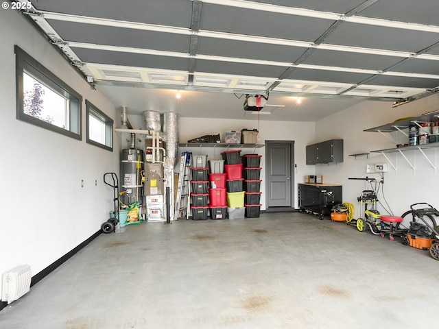 2231 SE Genesis Ct, Salem, OR 97306 - garage with secured water heater and a garage door opener