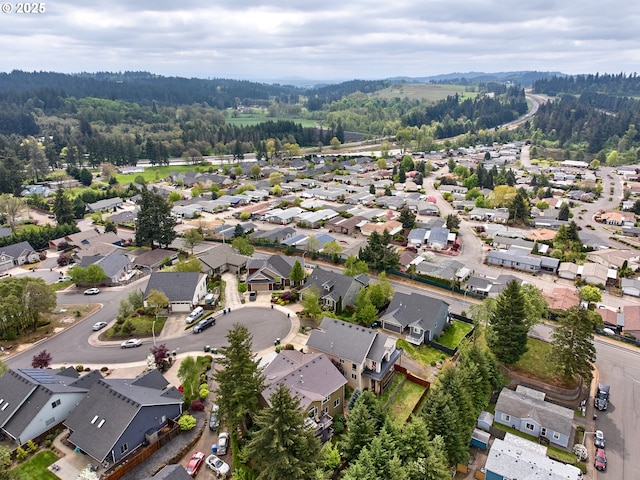 2231 SE Genesis Ct, Salem, OR 97306 - aerial view of property's location with nearby suburban area and a forest