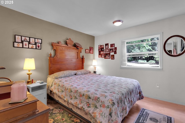 21161 S Upper Highland Rd, Beavercreek, OR 97004 - bedroom with wood finished floors and baseboards