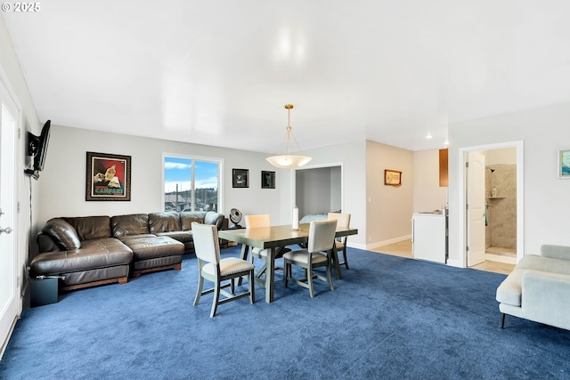 dining room with light colored carpet