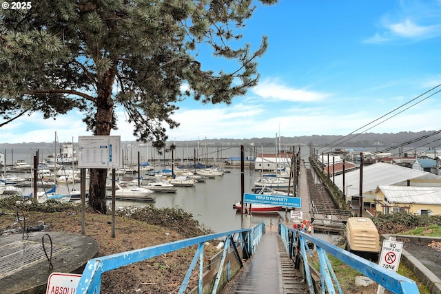 view of dock with a water view