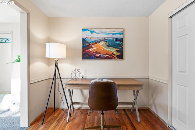 office area featuring hardwood / wood-style floors