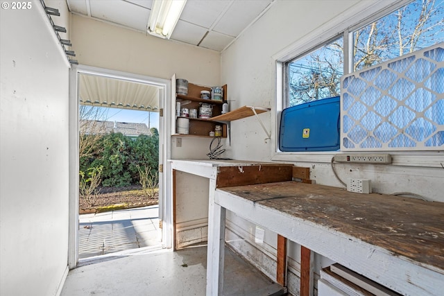 kitchen with concrete floors and a healthy amount of sunlight