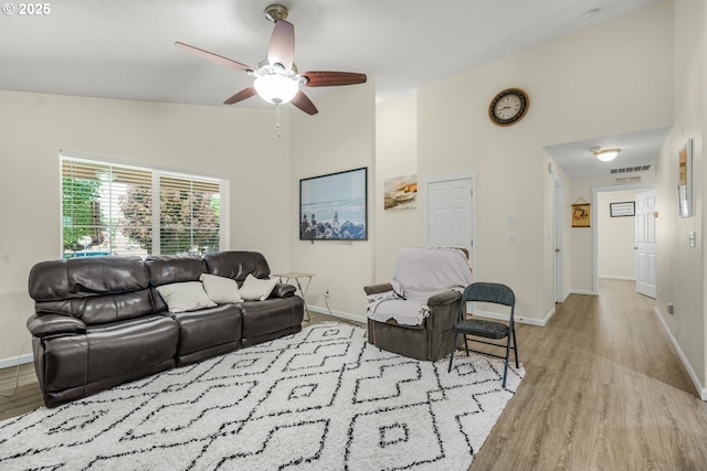 13417 NE 51st St, Vancouver, WA 98682 - living room featuring a ceiling fan, wood finished floors, and high vaulted ceiling