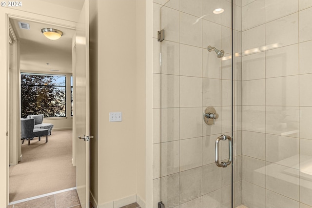 2172 NW 16th Ave, Portland, OR 97209 - bathroom featuring a stall shower and baseboards