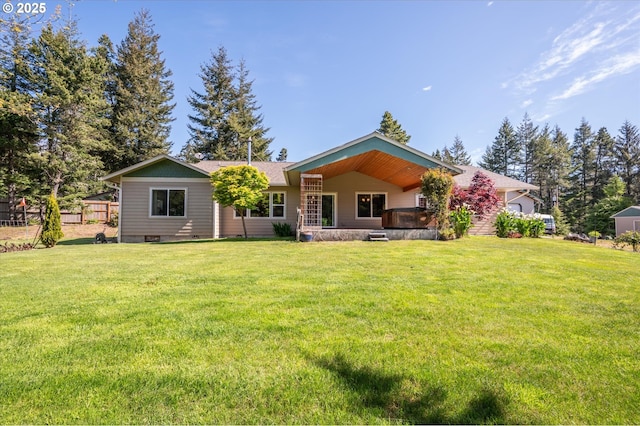 69143 Willow Rd, North Bend, OR 97459 - rear view of property featuring a lawn