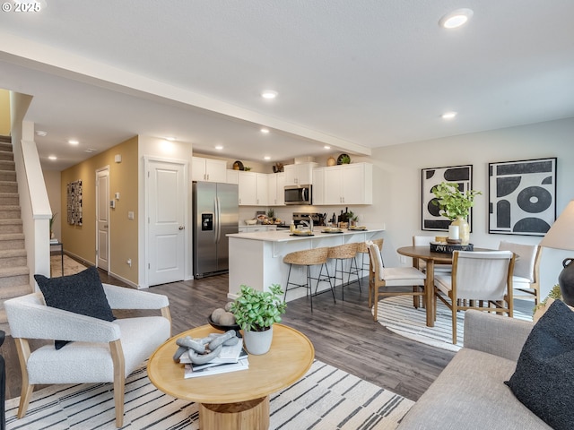 10386 NE 46th St, Vancouver, WA 98682 - living room with recessed lighting, dark wood-style floors, stairs, baseboards, and beam ceiling