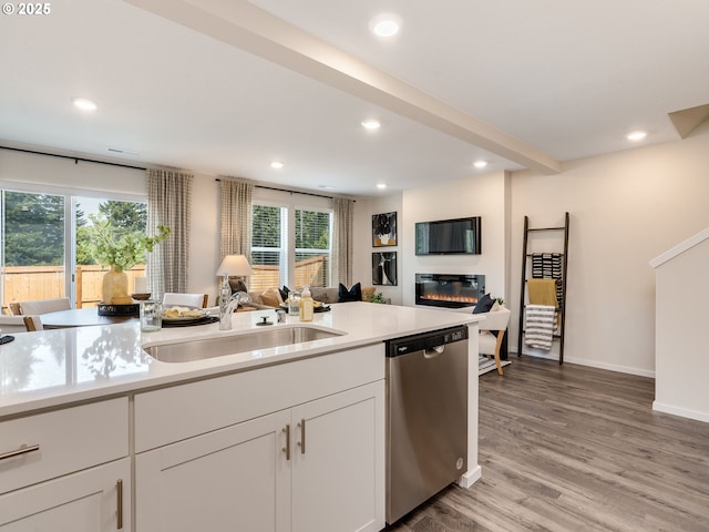 10386 NE 46th St, Vancouver, WA 98682 - kitchen featuring stainless steel dishwasher, a sink, open floor plan, plenty of natural light, and recessed lighting