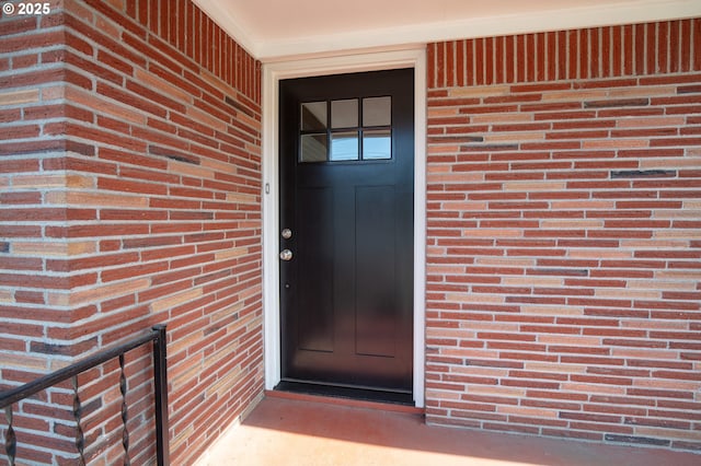 1911 E 12th St, The Dalles, OR 97058 - view of exterior entry featuring brick siding