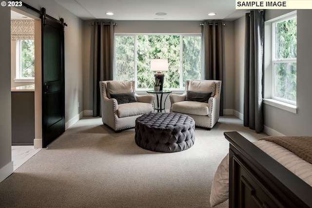 8710 S 3rd St, Ridgefield, WA 98642 - sitting room with a barn door, light colored carpet, and recessed lighting