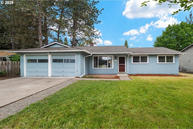 9070 SW Coral St, Portland, OR 97223 - ranch-style home featuring an attached garage, concrete driveway, and a chimney